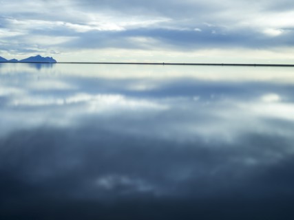 Reflection of clouds in still water