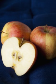 Sliced and whole apples