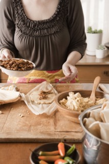 Woman making tamales
