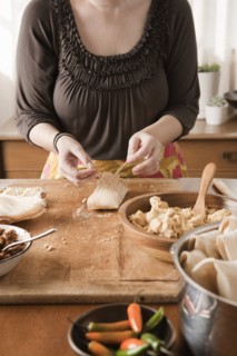 Woman making tamales