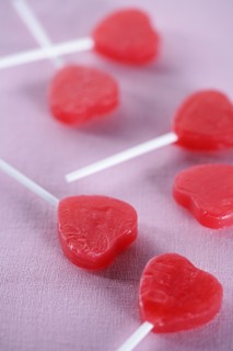 Group of red heart-shape lollipops