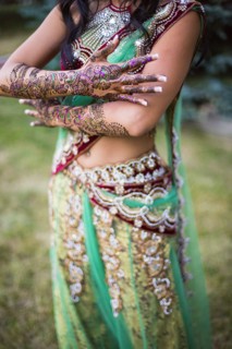 Woman wearing traditional Indian henna and robes