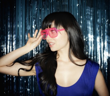 Glamorous mixed race woman in unusual sunglasses