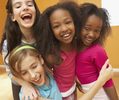 Children laughing and hugging