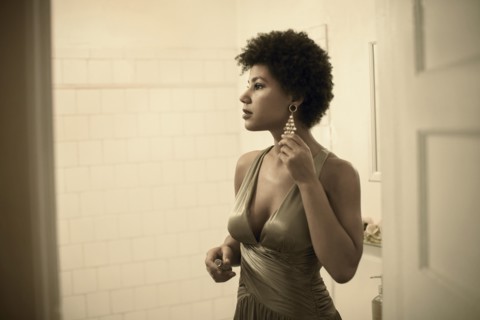 Woman getting ready in bathroom