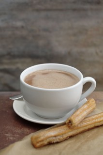 Close up of churros and Mexican hot chocolate