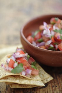 Salsa fresca in bowl and on tortilla chip