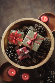 Christmas gifts in wooden bowl