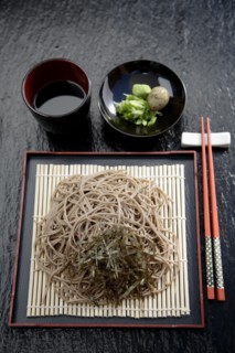 Asian noodles on plate with chopsticks