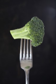 Broccoli floret on fork