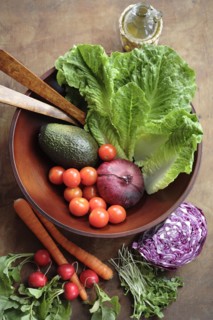 Fresh vegetables in wooden bowl