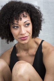 Close up of smiling Mixed Race woman