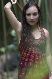 Caucasian woman standing in bamboo forest
