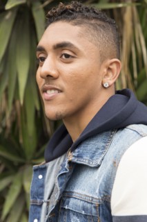 Portrait of pensive Mixed Race man