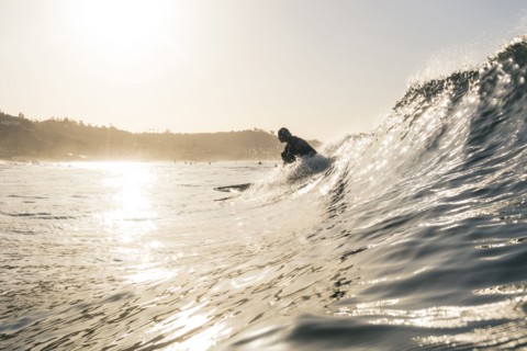 Caucasian man surfing