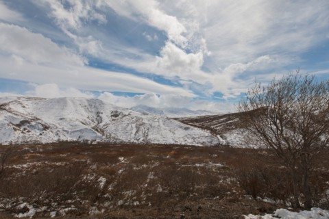 Clouds over snow on mountain