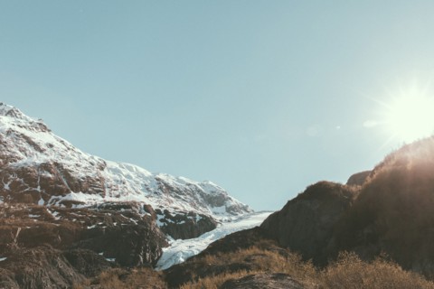 Sunbeams on snowy mountain