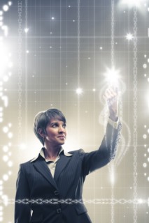 Sparks emerging from mixed race businesswoman's finger