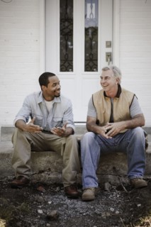 Carpenters sitting on front stoop