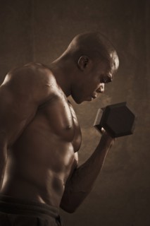 African American man lifting weights