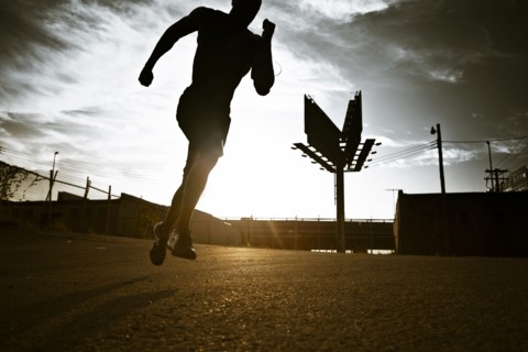 African American man jogging