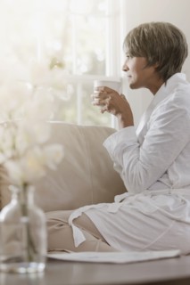 Native American woman drinking coffee