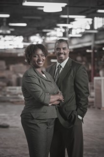 Black business people standing in warehouse