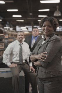 Business people standing in warehouse