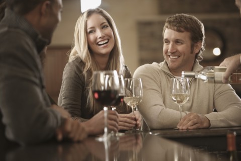 Friends drinking wine together