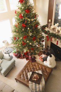 Family opening gifts Christmas morning