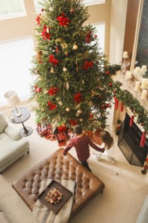 Children opening gifts Christmas morning