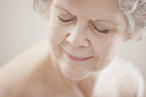 Caucasian woman with eyes closed