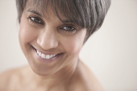 Smiling mixed race woman