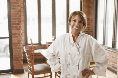 Caucasian chef standing in restaurant