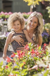 Mother and daughter at plant nursery