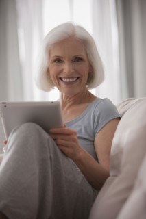 Caucasian woman using digital tablet