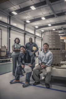 Workers together in factory