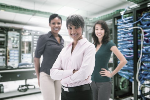 Businesswomen standing in server room