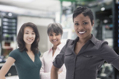 Businesswomen standing in server room