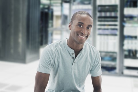 Black businessman in server room