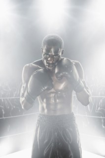 African American boxer in boxing ring
