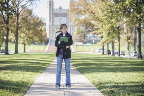 Caucasian student standing on campus