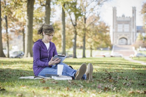 Caucasian student studying on campus