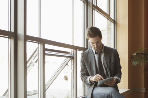 Businessman using tablet computer