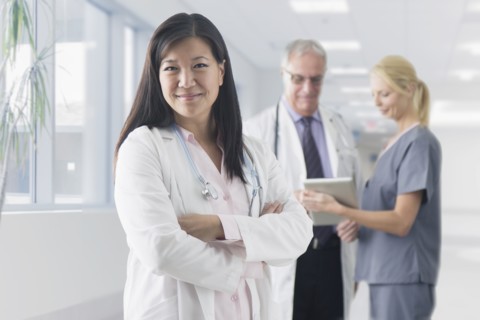Asian doctor smiling in hospital