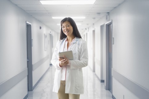 Asian doctor smiling in hospital