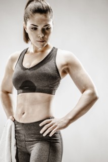 Caucasian woman resting after workout