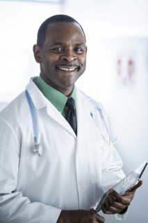 African American doctor smiling in office