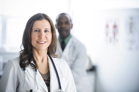 Doctors standing in office