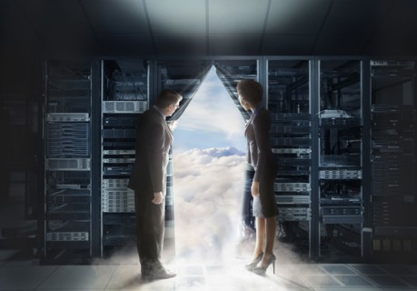 Business people pulling back curtain to clouds